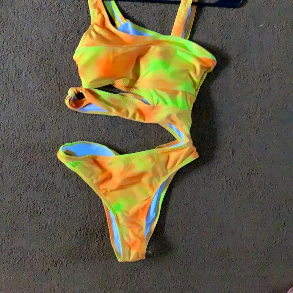This is a yellow and orange one piece bathing suit